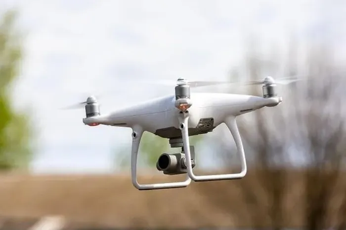 Framed Print : Drone quadrocopter with high resolution digital camera on the sky background Framed Print : Drone quadrocopter with high resolution digital camera on the sky background