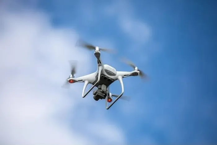 Framed Print : Drone quadrocopter with high resolution digital camera on the sky background Framed Print : Drone quadrocopter with high resolution digital camera on the sky background