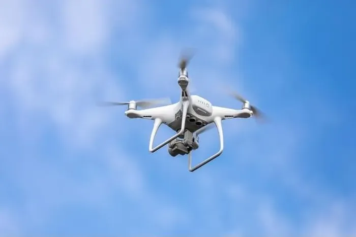 Framed Print : Drone quadrocopter with high resolution digital camera on the sky background Framed Print : Drone quadrocopter with high resolution digital camera on the sky background