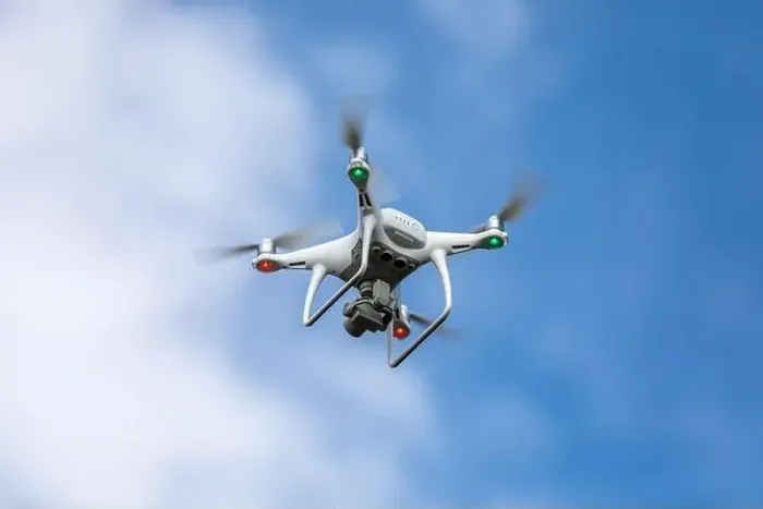 Framed Print : Drone quadrocopter with high resolution digital camera on the sky background Framed Print : Drone quadrocopter with high resolution digital camera on the sky background