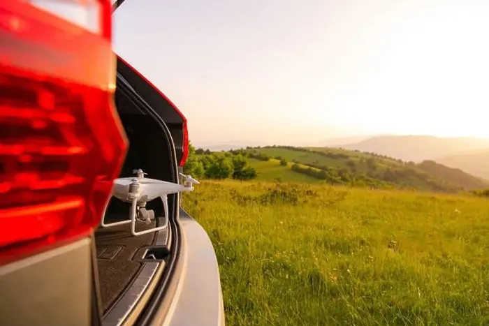 Framed Print : drone ready for fly in suv trunk landscape nature mountains sunset Framed Print : drone ready for fly in suv trunk landscape nature mountains sunset
