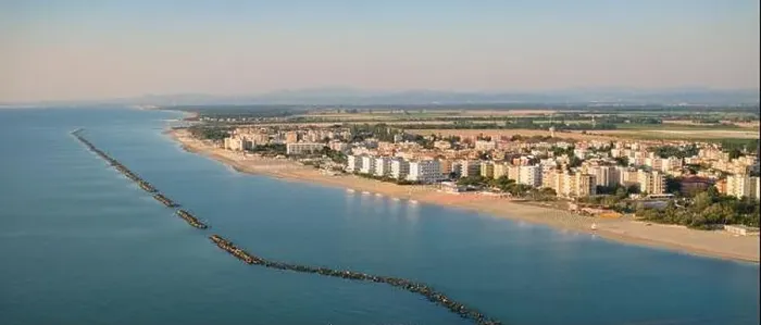 Framed Print : Drone shot of Adriatic shoreline.Summer vacation concept.Lido Adriano town, Adriatic coast, Emilia Romagna, Italy Framed Print : Drone shot of Adriatic shoreline.Summer vacation concept.Lido Adriano town, Adriatic coast, Emilia Romagna, Italy