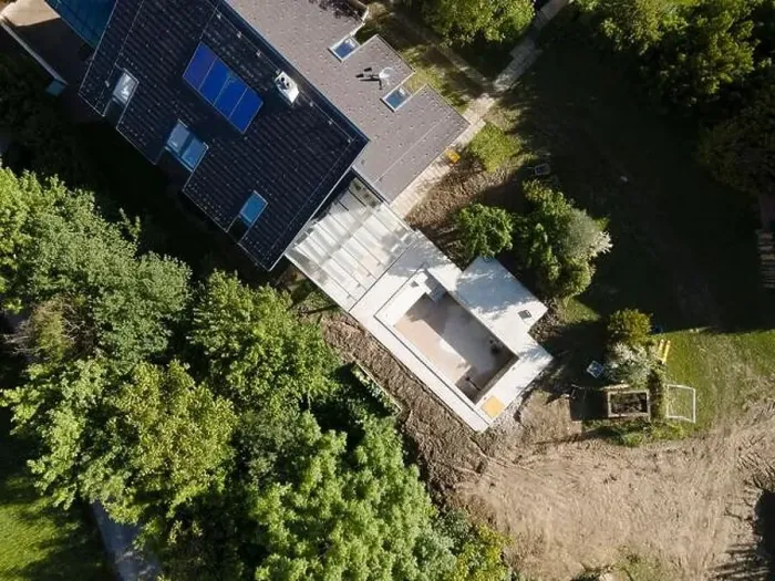 Framed Print : Drone shot of pool construction site in a garden, earth around the pool is already backfilled Framed Print : Drone shot of pool construction site in a garden, earth around the pool is already backfilled