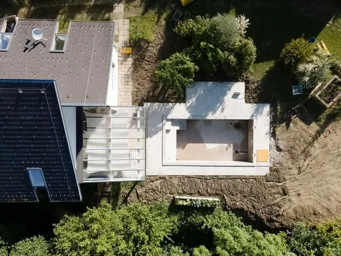 Framed Print : Drone shot of pool construction site in a garden, earth around the pool is already backfilled Framed Print : Drone shot of pool construction site in a garden, earth around the pool is already backfilled