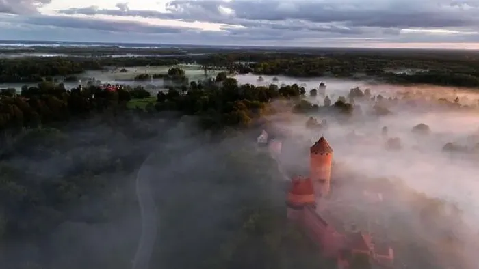 Framed Print : drone shot of turaida castle in early morning with fog in the forest valley Framed Print : drone shot of turaida castle in early morning with fog in the forest valley