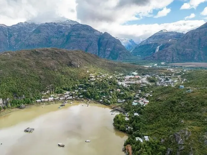 Framed Print : Drone view of Caleta Tortel with its small cabins - Discovering the beautiful village while traveling the Carretera Framed Print : Drone view of Caleta Tortel with its small cabins - Discovering the beautiful village while traveling the Carretera