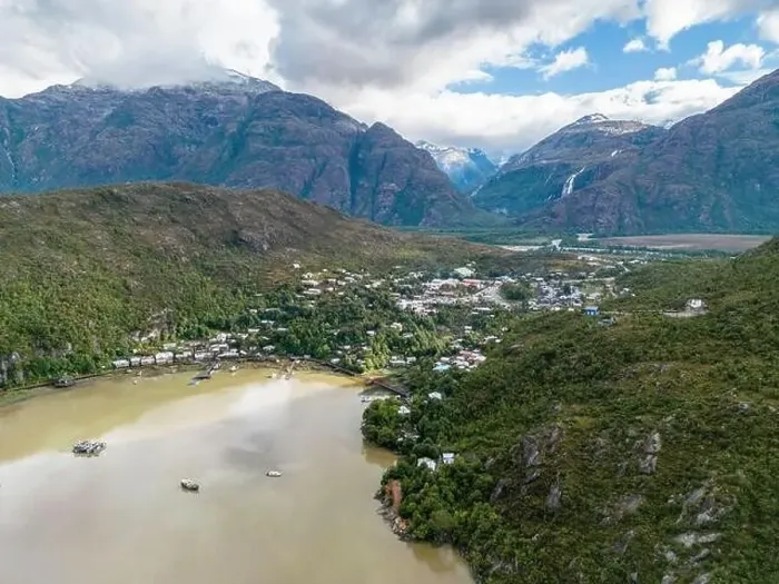 Framed Print : Drone view of Caleta Tortel with its small cabins - Discovering the beautiful village while traveling the Carretera Framed Print : Drone view of Caleta Tortel with its small cabins - Discovering the beautiful village while traveling the Carretera