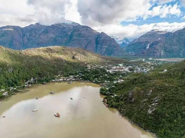 Framed Print : Drone view of Caleta Tortel with its small cabins - Discovering the beautiful village while traveling the Carretera Framed Print : Drone view of Caleta Tortel with its small cabins - Discovering the beautiful village while traveling the Carretera