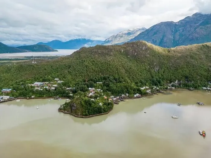 Framed Print : Drone view of Caleta Tortel with its small cabins - Discovering the beautiful village while traveling the Carretera Framed Print : Drone view of Caleta Tortel with its small cabins - Discovering the beautiful village while traveling the Carretera