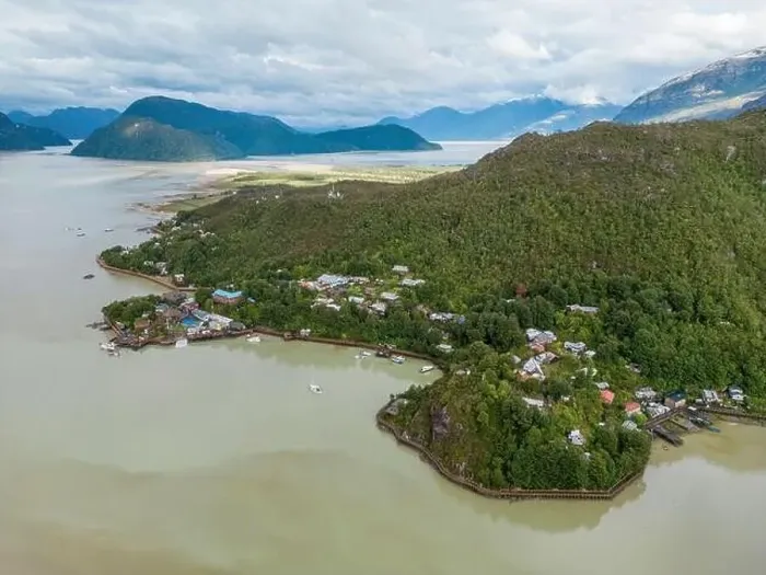 Framed Print : Drone view of Caleta Tortel with its small cabins - Discovering the beautiful village while traveling the Carretera Framed Print : Drone view of Caleta Tortel with its small cabins - Discovering the beautiful village while traveling the Carretera