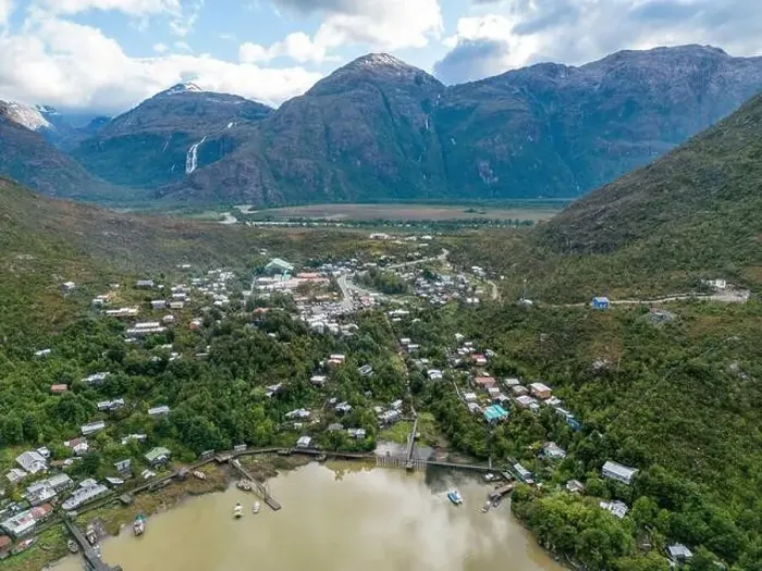 Framed Print : Drone view of Caleta Tortel with its small cabins - Discovering the beautiful village while traveling the Carretera Framed Print : Drone view of Caleta Tortel with its small cabins - Discovering the beautiful village while traveling the Carretera
