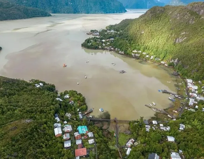 Framed Print : Drone view of Caleta Tortel with its small cabins - Discovering the beautiful village while traveling the Carretera Framed Print : Drone view of Caleta Tortel with its small cabins - Discovering the beautiful village while traveling the Carretera