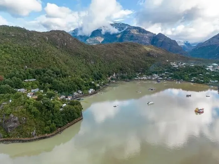 Framed Print : Drone view of Caleta Tortel with its small cabins - Discovering the beautiful village while traveling the Carretera Framed Print : Drone view of Caleta Tortel with its small cabins - Discovering the beautiful village while traveling the Carretera