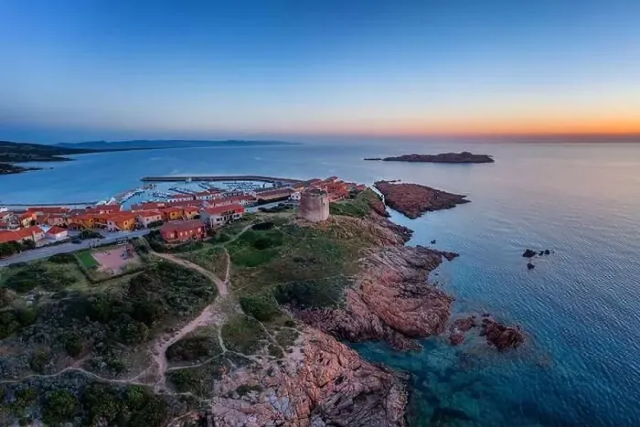 Framed Print : From above drone view of Castelsardo village with its historic tower Framed Print : From above drone view of Castelsardo village with its historic tower
