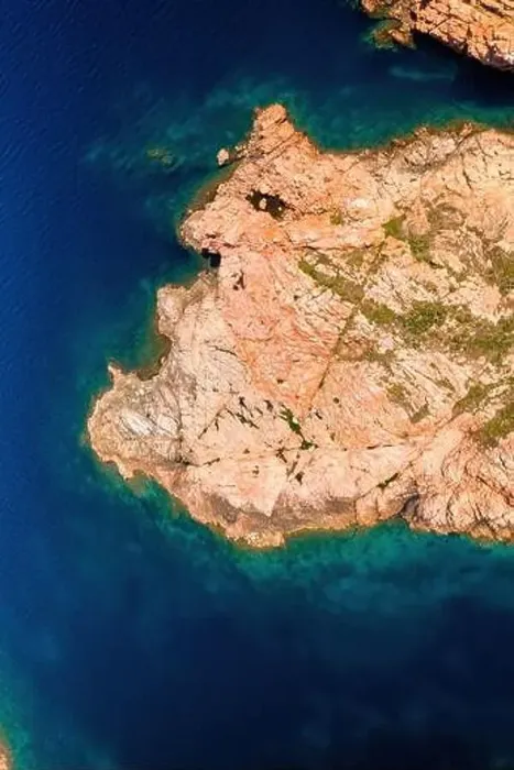 Framed Print : Drone top view of Castelsardo's rugged coastline with serene blue waters in Sardinia, Italy Framed Print : Drone top view of Castelsardo's rugged coastline with serene blue waters in Sardinia, Italy