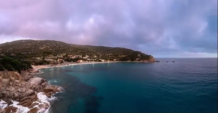 Framed Print : A drone view of Cavoli Beach on Elba Island just after sunset with a misty purple sky Framed Print : A drone view of Cavoli Beach on Elba Island just after sunset with a misty purple sky