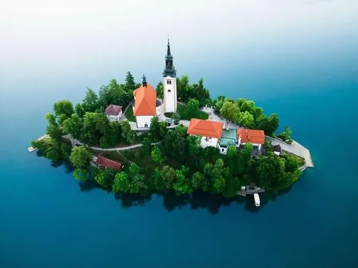Framed Print : Drone View on Church on Island on Lake Bled in Slovenia at Summer Framed Print : Drone View on Church on Island on Lake Bled in Slovenia at Summer