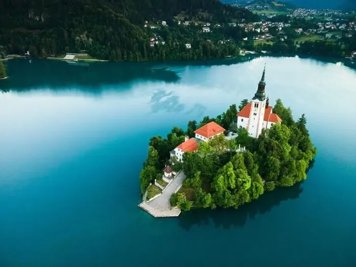 Framed Print : Drone View on Church on Island on Lake Bled in Slovenia at Summer Framed Print : Drone View on Church on Island on Lake Bled in Slovenia at Summer
