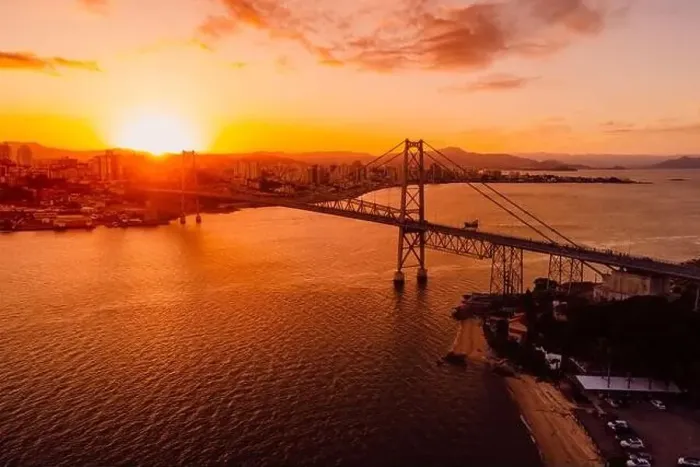 Framed Print : Drone view of city and Hercilio luz bridge with sunset in Florianopolis, Brazil Framed Print : Drone view of city and Hercilio luz bridge with sunset in Florianopolis, Brazil