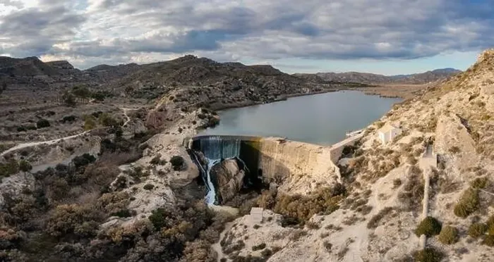 Framed Print : A drone view of the Elche Reservoir and dam wall with waterfall and surrounding semi-desert landscape Framed Print : A drone view of the Elche Reservoir and dam wall with waterfall and surrounding semi-desert landscape