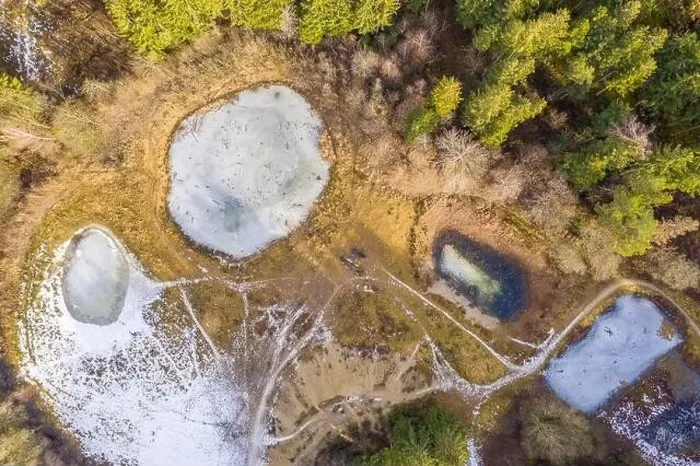 Framed Print : Drone top view of frozen lakes covered with ice at the winter season Framed Print : Drone top view of frozen lakes covered with ice at the winter season