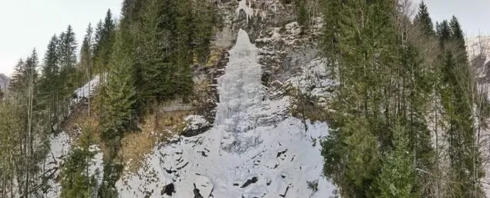 Framed Print : Drone view at a frozen waterfall at Engelberg on the Swiss alps Framed Print : Drone view at a frozen waterfall at Engelberg on the Swiss alps