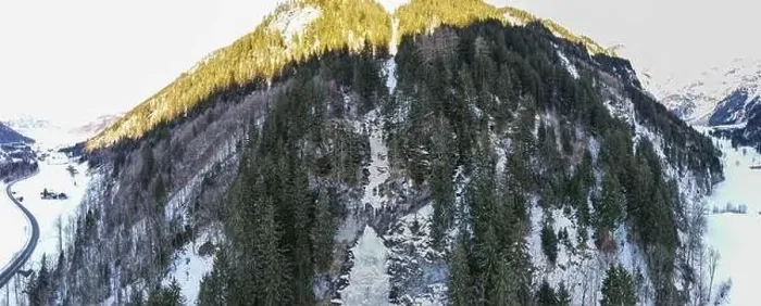 Framed Print : Drone view at a frozen waterfall at Engelberg on the Swiss alps Framed Print : Drone view at a frozen waterfall at Engelberg on the Swiss alps