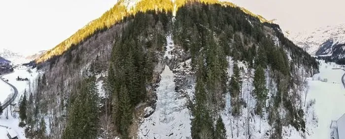 Framed Print : Drone view at a frozen waterfall at Engelberg on the Swiss alps Framed Print : Drone view at a frozen waterfall at Engelberg on the Swiss alps