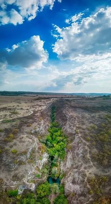 Framed Print : Drone view at Hotnishki Waterfall near Veliko Tarnovo during summer with great acqua colors Framed Print : Drone view at Hotnishki Waterfall near Veliko Tarnovo during summer with great acqua colors