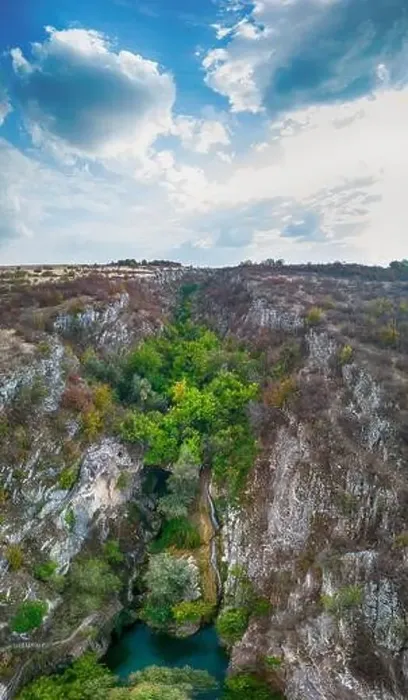 Framed Print : Drone view at Hotnishki Waterfall near Veliko Tarnovo during summer with great acqua colors Framed Print : Drone view at Hotnishki Waterfall near Veliko Tarnovo during summer with great acqua colors