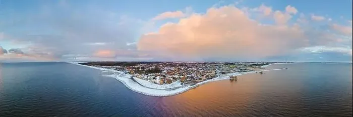 Framed Print : Drone view of the Lighthouse of Urk during winter with snow landscape in the Netherlands Framed Print : Drone view of the Lighthouse of Urk during winter with snow landscape in the Netherlands