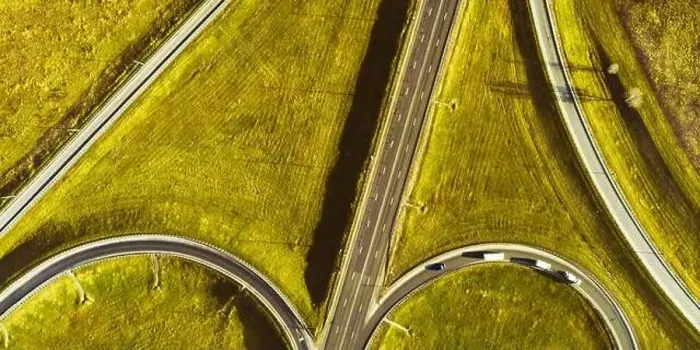 Framed Print : Drone view of morning empty country side road with beautiful green landscape around Framed Print : Drone view of morning empty country side road with beautiful green landscape around