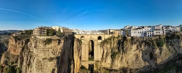Framed Print : Drone view at the old bridge of Ronda on Andalusia in Spain Framed Print : Drone view at the old bridge of Ronda on Andalusia in Spain