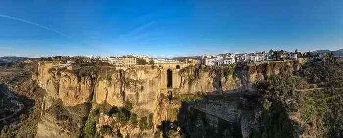 Framed Print : Drone view at the old bridge of Ronda on Andalusia in Spain Framed Print : Drone view at the old bridge of Ronda on Andalusia in Spain