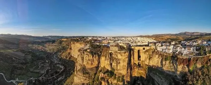 Framed Print : Drone view at the old bridge of Ronda on Andalusia in Spain Framed Print : Drone view at the old bridge of Ronda on Andalusia in Spain