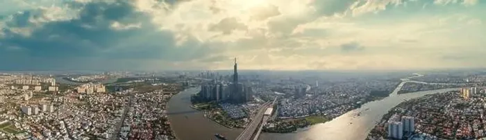 Framed Print : Drone view photo of Ho Chi Minh city skyline with dramatic sky Framed Print : Drone view photo of Ho Chi Minh city skyline with dramatic sky