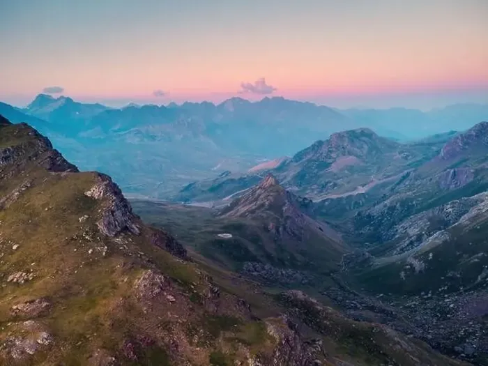 Framed Print : Drone view of picturesque landscape with Anayet mountain range covered with green grass under sky in Pyrenees Framed Print : Drone view of picturesque landscape with Anayet mountain range covered with green grass under sky in Pyrenees