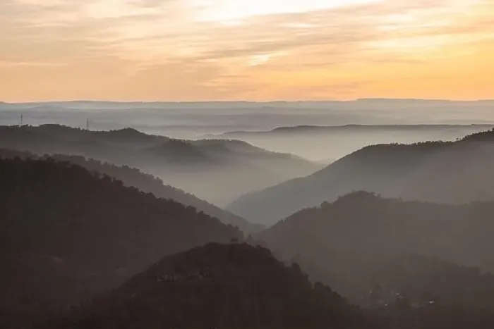 Framed Print : Drone view of picturesque scenery with bright sunset sky over foggy mountains and hills in Almatret Framed Print : Drone view of picturesque scenery with bright sunset sky over foggy mountains and hills in Almatret