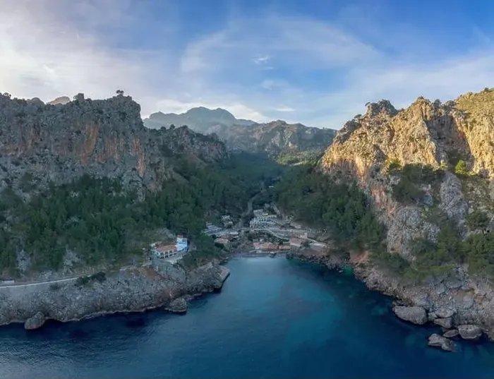 Framed Print : A drone view of the small fishing hamlet and harbour of Sa Calobra in the rugged Framed Print : A drone view of the small fishing hamlet and harbour of Sa Calobra in the rugged