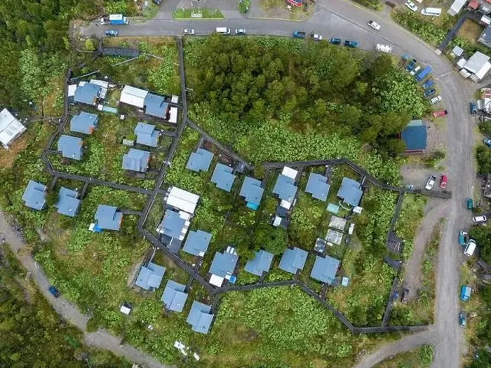 Framed Print : Drone view of Tortel with its small cabins - Discovering the beautiful village while traveling the Carretera Austral in Framed Print : Drone view of Tortel with its small cabins - Discovering the beautiful village while traveling the Carretera Austral in