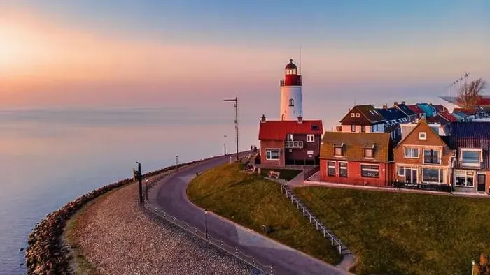 Framed Print : Drone view at Urk Flevoland Netherlands sunset at the lighthouse and harbor of Urk Holland Framed Print : Drone view at Urk Flevoland Netherlands sunset at the lighthouse and harbor of Urk Holland