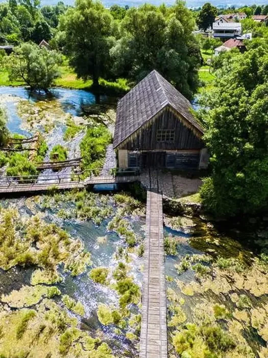 Framed Print : Drone view of wooden mill houses of Majerovo Vrilo located on Gacka river source in the village of Sinac, Croatia Framed Print : Drone view of wooden mill houses of Majerovo Vrilo located on Gacka river source in the village of Sinac, Croatia