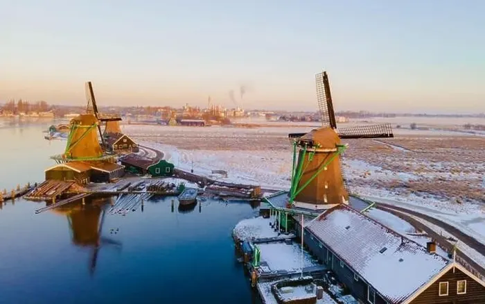 Framed Print : Drone view at the Zaanse Schans windmill village during winter with snow landscape in the Netherlands Holland village Framed Print : Drone view at the Zaanse Schans windmill village during winter with snow landscape in the Netherlands Holland village