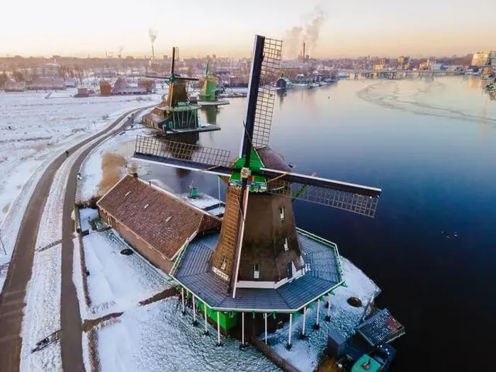 Framed Print : Drone view at the Zaanse Schans windmill village during winter with snow landscape in the Netherlands Holland village Framed Print : Drone view at the Zaanse Schans windmill village during winter with snow landscape in the Netherlands Holland village