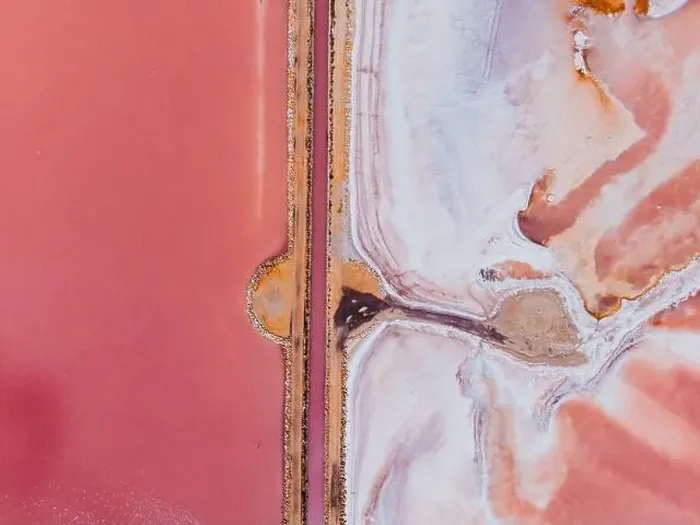 Framed Print : From above drove view of amazing pink salt lake and of shore in sunny summer day Framed Print : From above drove view of amazing pink salt lake and of shore in sunny summer day