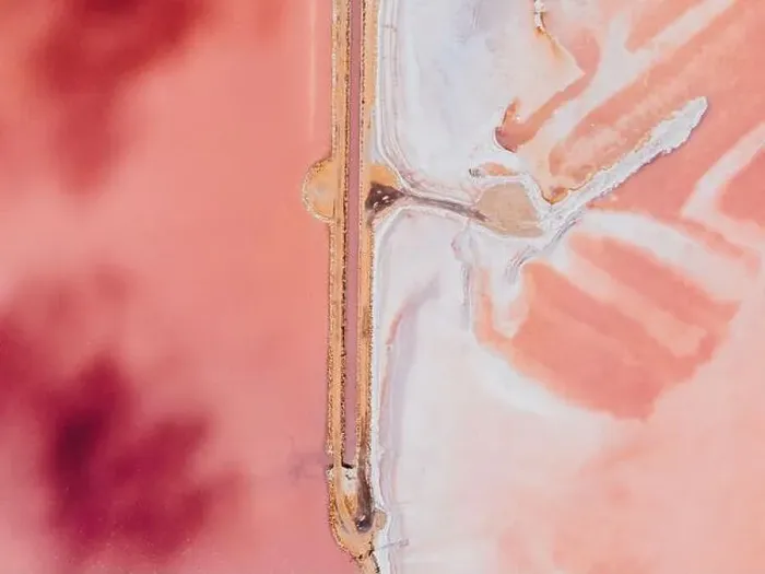 Framed Print : From above drove view of amazing pink salt lake and of shore in sunny summer day Framed Print : From above drove view of amazing pink salt lake and of shore in sunny summer day