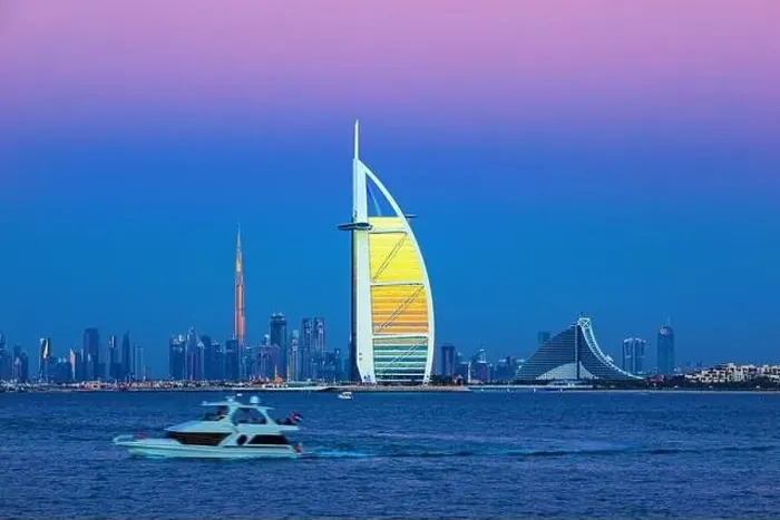 Framed Print : Dubai city - amazing city center skyline and famous Jumeirah beach at sunset, United Arab Emirates