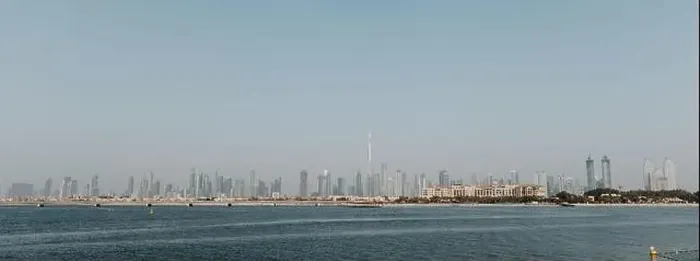 Framed Print : Dubai downtown city landscape view with sea in the front Framed Print : Dubai downtown city landscape view with sea in the front