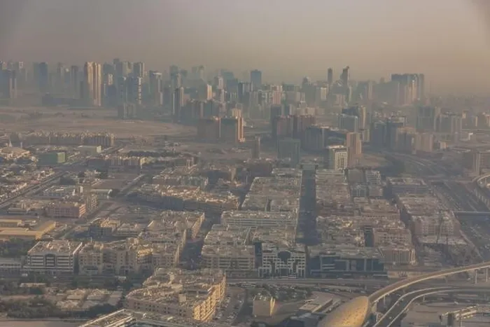 Framed Print : DUBAI, UAE - APRIL 29: Aerial view of Downtown Dubai and skyscrapers during morning sandstorm. Highway and trainline, soft light over the sand Framed Print : DUBAI, UAE - APRIL 29: Aerial view of Downtown Dubai and skyscrapers during morning sandstorm. Highway and trainline, soft light over the sand