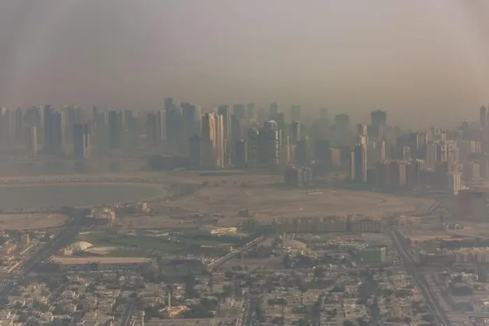 Framed Print : DUBAI, UAE - APRIL 29: Aerial view of Downtown Dubai and skyscrapers during morning sandstorm. Highway and trainline, soft light over the sand Framed Print : DUBAI, UAE - APRIL 29: Aerial view of Downtown Dubai and skyscrapers during morning sandstorm. Highway and trainline, soft light over the sand